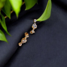 Gold-Toned Earrings with Sparkling Gemstones