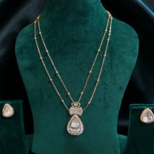 Chandrika Pearl Kundan Layered Pendant Set