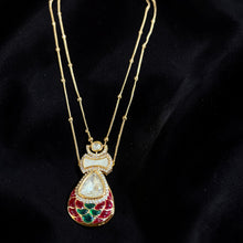 Chandrika Pearl Kundan Layered Pendant Set