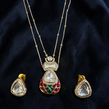 Chandrika Pearl Kundan Layered Pendant Set