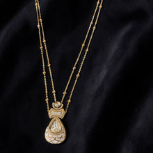 Chandrika Pearl Kundan Layered Pendant Set