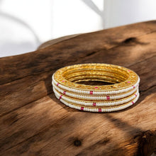 Elegant Golden plated Pearl Bangles