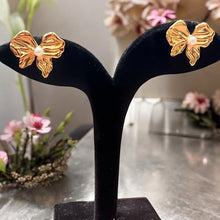 Pearl Petal Bow Studs