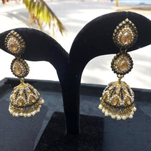 Kundan and Pearl Embellished Jhumka Earrings
