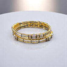 Golden Bangles with American Diamond Accents