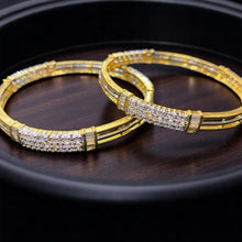 Triple-Strand Golden Bangles with Cluster American Diamond Center