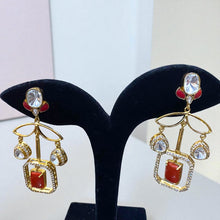 Crimson Grace Danglers