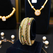 Regal Gemstone Golden Bangles